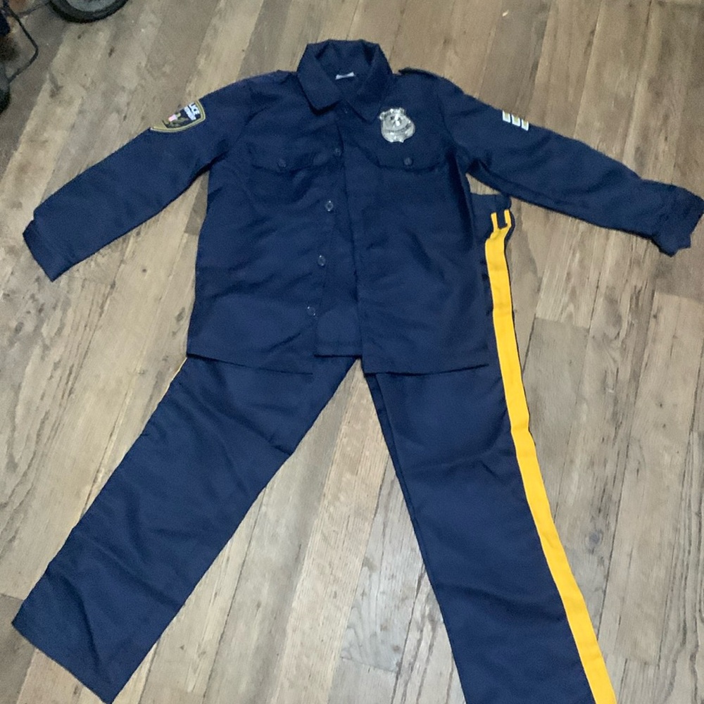 Police costume with badge. AM